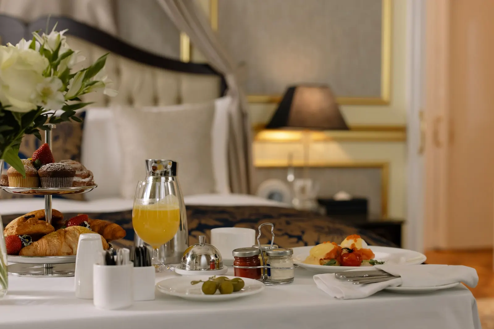 Breakfast laid out on a table in a hotel room